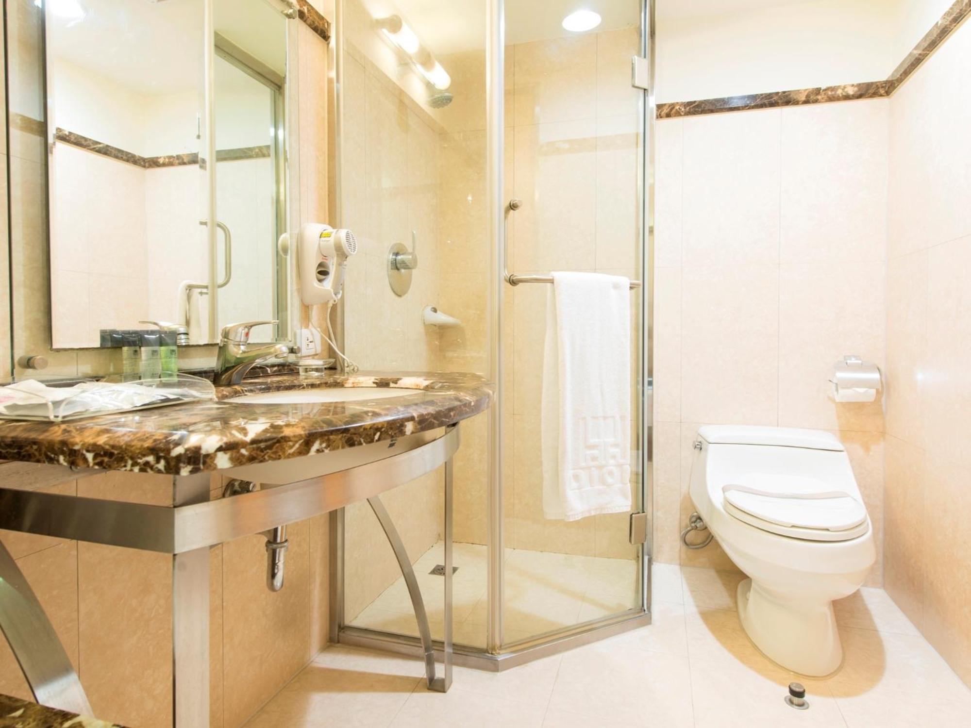 Hotel Dion Taichung Quarto foto